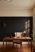 Black acoustic slat wall panel: gentlemans office