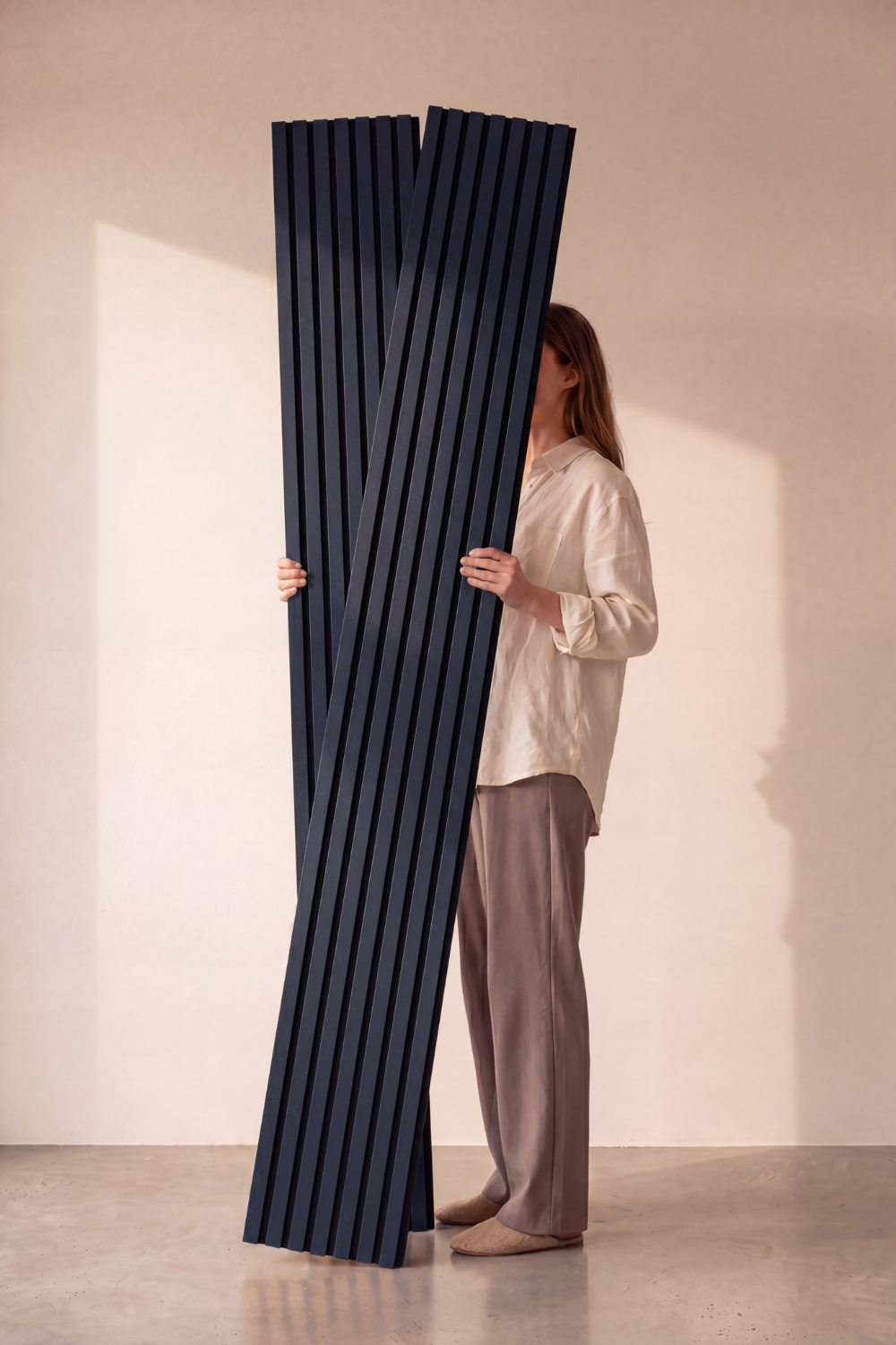 Midnight Blue acoustic slat wall panel: studio panels held