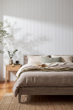 White acoustic slat wall panel: bedroom