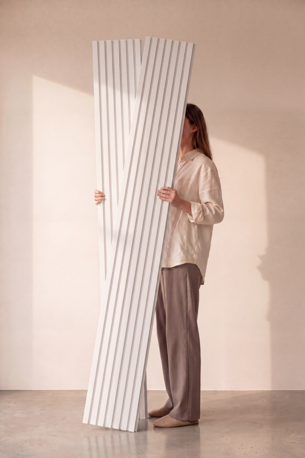 White acoustic slat wall panel: studio held panels