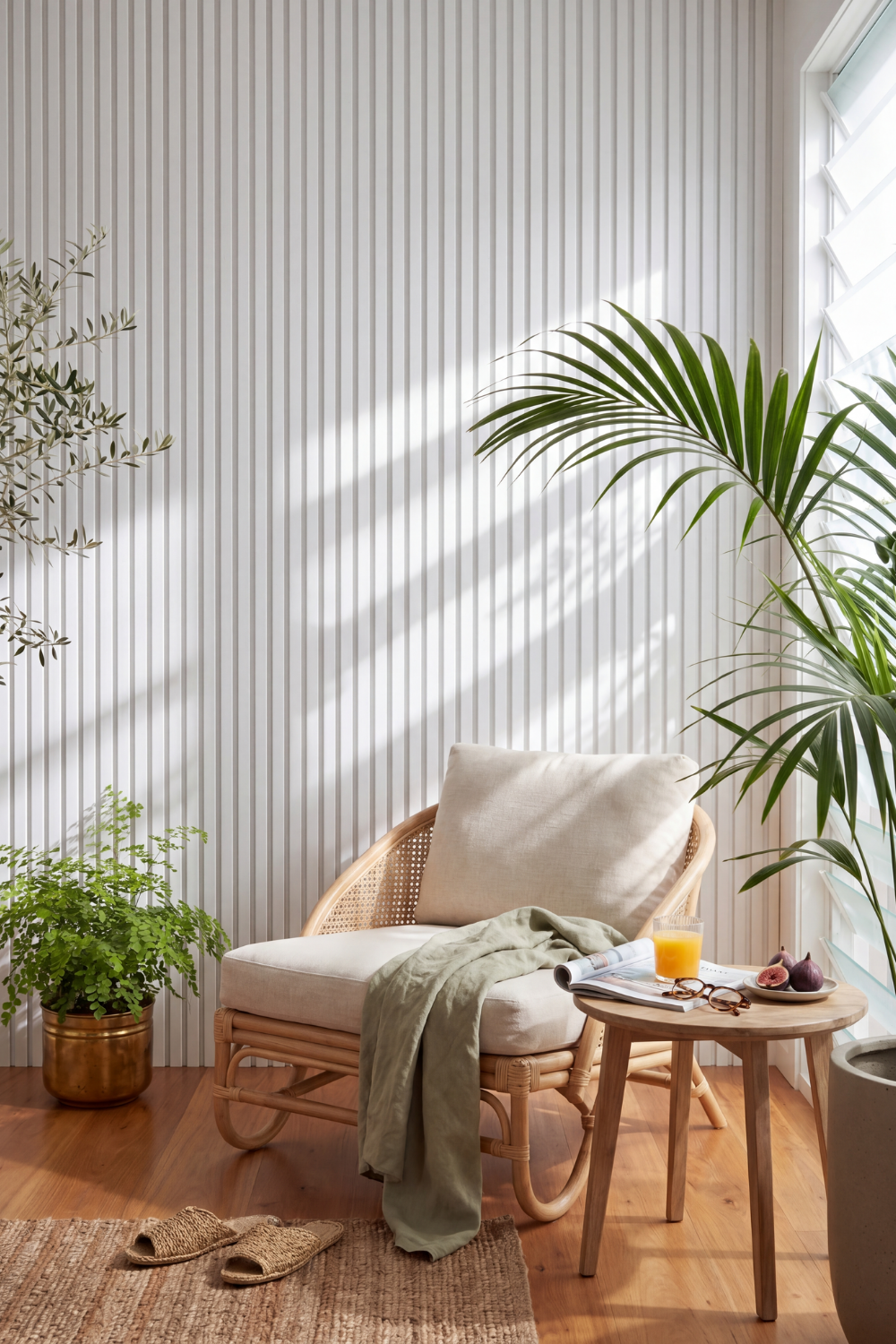 White acoustic slat wall panel: sunny reading nook